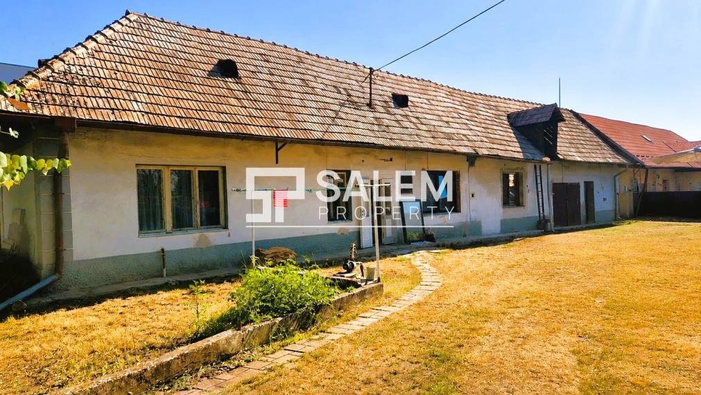 Rodinný dom so slnečnou záhradou a garážou na Sliači